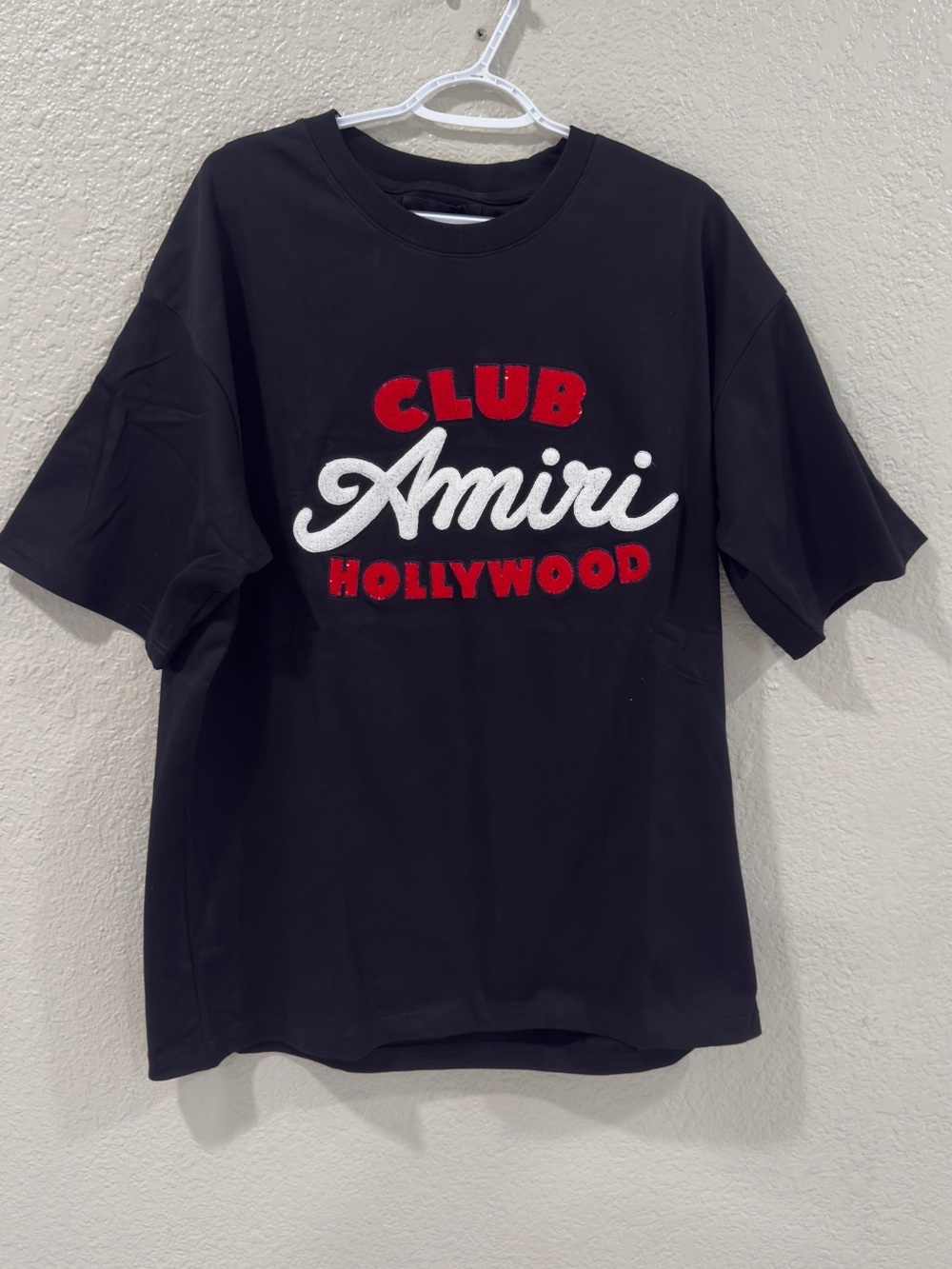 AMIRI Black Tee with Red & White Club Hollywood Script